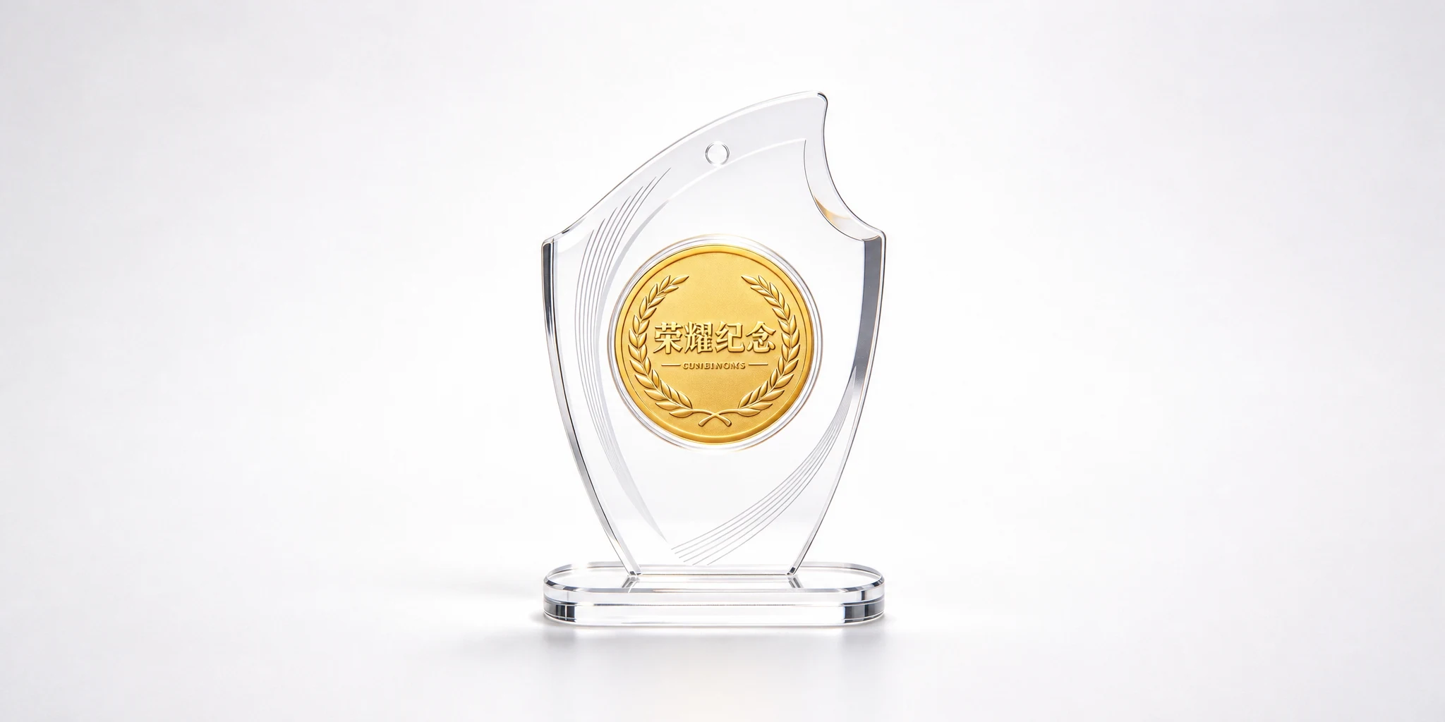 Teardrop acrylic display holding an inset gold commemorative coin