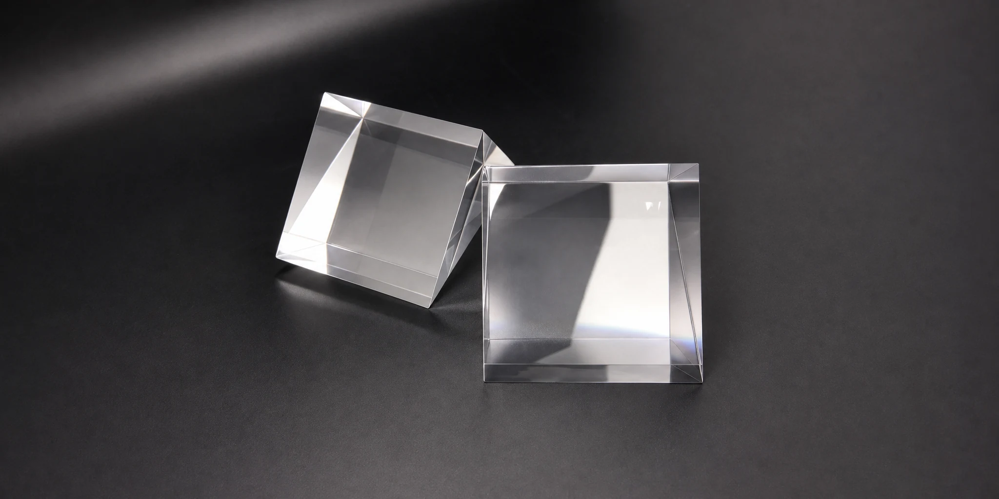 Polished acrylic blocks illustrating edge finishing options