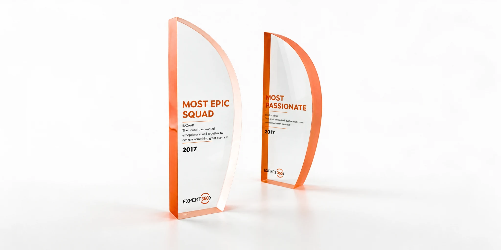 Curved orange and clear acrylic trophy awards